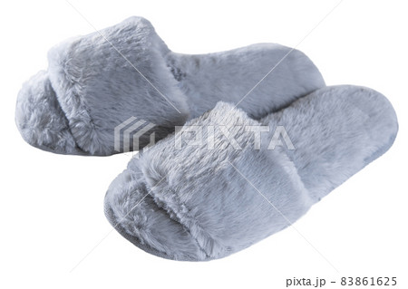 Gray home fluffy slippers isolated on a white background, comfort and warmth 83861625