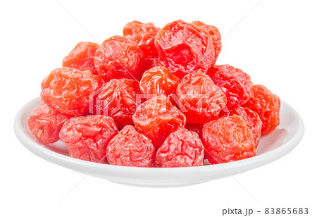 Dried red prunes fruits (Preserved fruits Chinese plum) in withe dish. 83865683