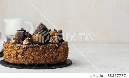 front view sweet chocolate cake with copy space. High quality beautiful photo concept 83867777