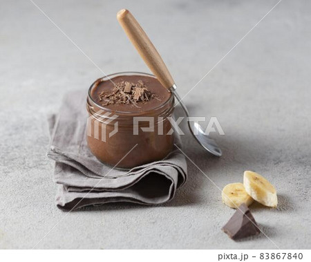high angle banana chocolate pudding. High quality beautiful photo concept 83867840