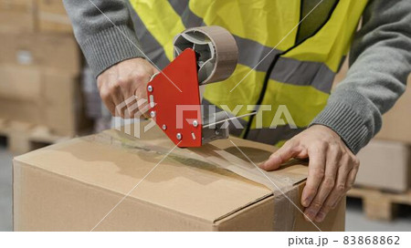man warehouse working with packages. High quality beautiful photo concept 83868862