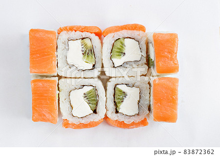 Japanese food, tasty of meal for lunch. Seafood. Philadelphia roll, salmon, soft cheese and kiwi Japanese food, tasty of meal for lunch. Seafood. Philadelphia roll, salmon, soft cheese and kiwi 83872362