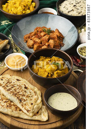 high angle indian food assortment. High quality beautiful photo concept high angle indian food assortment. High quality beautiful photo concept 83873887