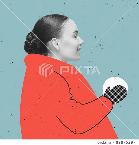 Contemporary art collage of beautiful woman in drawn red down-padded coat making snowball isolated over blue background. Concept of winter season 83875297