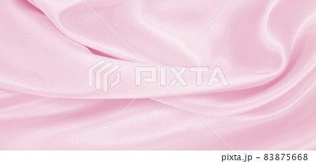 Smooth elegant pink silk or satin texture as wedding background. Luxurious background design Smooth elegant pink silk or satin texture as wedding background. Luxurious background design 83875668