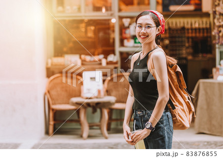 Portrait hipster Asian teen summer dressing walking in shopping street happy smile 83876855