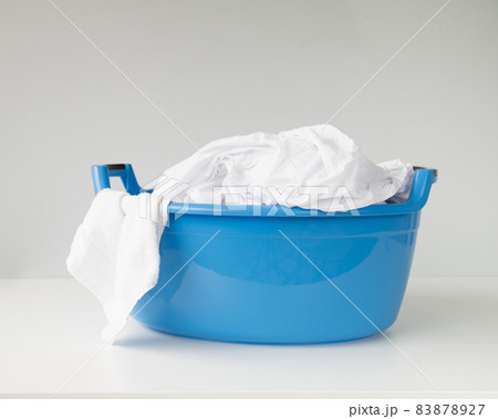 front view full laundry basket. High quality beautiful photo concept 83878927