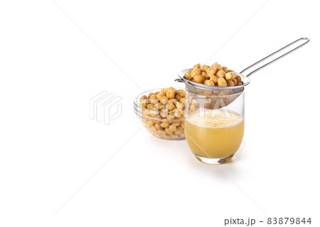 Chickpea water aquafaba isolated on white background. Copy space. Chickpea water is a substitute for eggs in pastries	 83879844