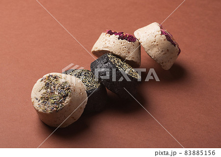 Solid natural shampoo bars, zero waste concept on brown background Solid natural shampoo bars, zero waste concept on brown background 83885156