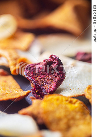 Dried chips from different organic vegetables close-up 83885188