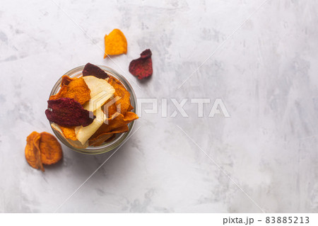 Vegetable chips in a jar kind,top view 83885213