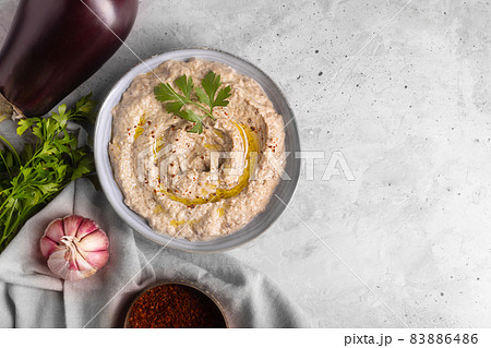 Baba ganoush from baked eggplant with sesame paste with ingredients Baba ganoush from baked eggplant with sesame paste with ingredients 83886486