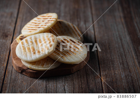 Traditional Venezuelan food arepa made from cornmeal 83886507