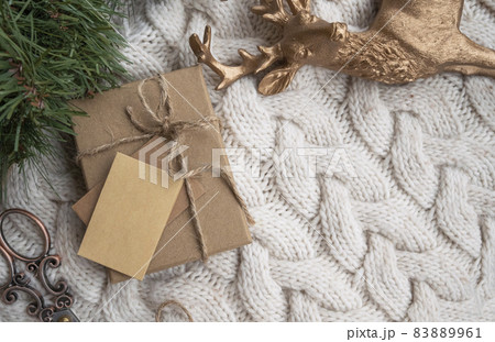 new year gift mockup. Craft gift box in hands. 83889961