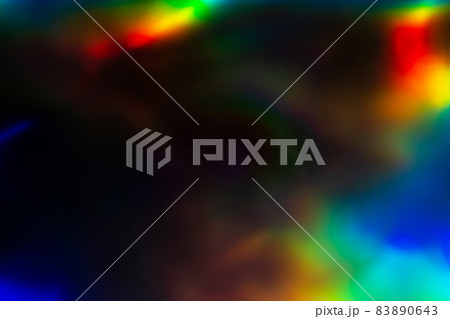 colorful rainbow crystal light leaks on black background 83890643