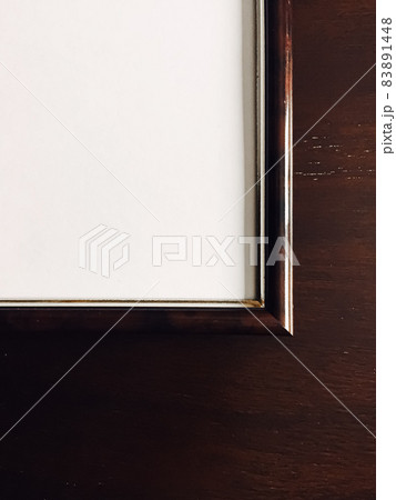 Blank picture frame on wooden background, luxury home decor and interior design, poster print and printable art mockup 83891448