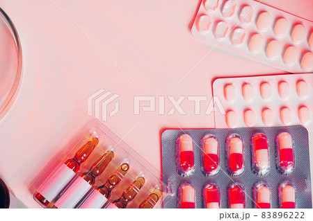 Medicine pills on white table for medical concept Medicine pills on white table for medical concept 83896222