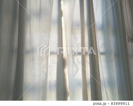 Abstract of transparent curtain against sky. 83899911