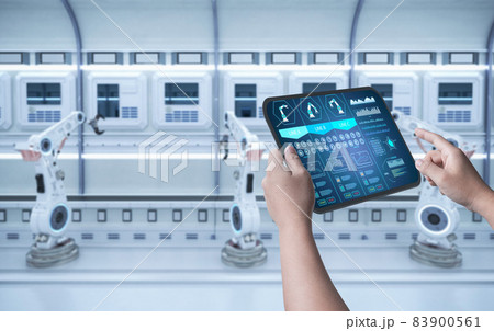 Technician control automation robot in factory 83900561