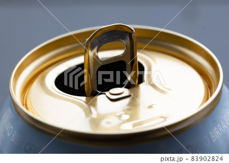 Aluminum tin can for drink. Tin Copper Can for beer. Jar for fizzy water. Capacity for carbonated fruit water. Soda in a container. Close-up Aluminum tin can for drink. Tin Copper Can for beer. Jar for fizzy water. Capacity for carbonated fruit water. Soda in a container. Close-up 83902824
