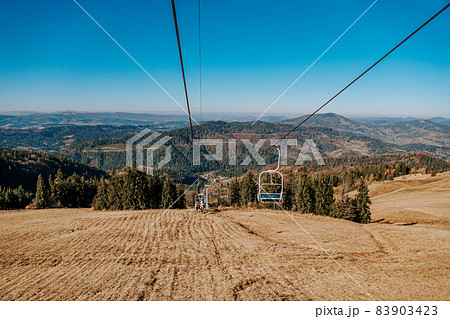 Ski lift in beautiful mountains. Mount Zakhar Berkut. Ukraine. Attractions. Ski lift in beautiful mountains. Mount Zakhar Berkut. Ukraine. Attractions. 83903423