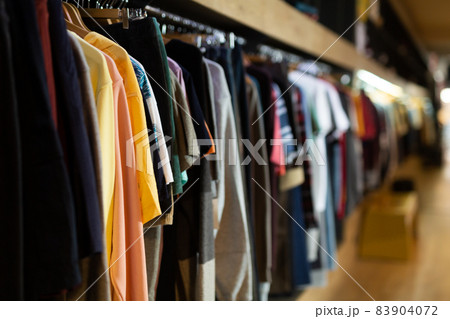 Assortment of summer clothing in modern store Assortment of summer clothing in modern store 83904072
