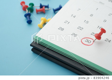 deadline concept with push pin on calendar date close up  83904246