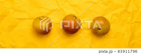 Delicious ripe organic plums on yellow background, copy space. Top view, flat lay 83911796
