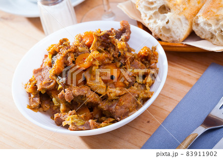 Stew of cabbage with pork Stew of cabbage with pork 83911902