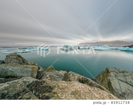 Ice lagoon long exposure, cloudy day in Jokusarlon Ice lagoon long exposure, cloudy day in Jokusarlon 83912738