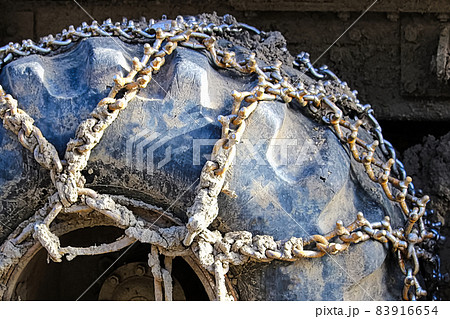 Chains used on a heavy equipment tire for grip Chains used on a heavy equipment tire for grip 83916654