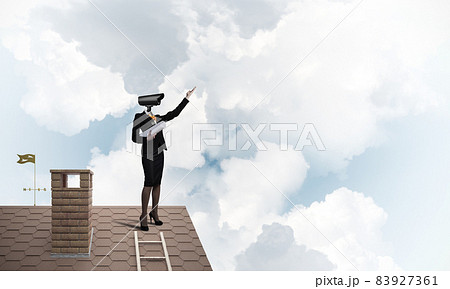 Concept of security and privacy protection with camera headed woman 83927361