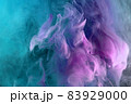 Abstract pink and blue and green color background. Swirling vibrant hookah smoke, dynamic paint in water. 83929000
