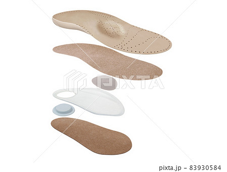 Medical insoles. Isolated orthopedic insoles on a white background. Treatment and prevention of flat feet and foot diseases. Foot care. Insole cutaway layers. Medical insoles. Isolated orthopedic insoles on a white background. Treatment and prevention of flat feet and foot diseases. Foot care. Insole cutaway layers. 83930584
