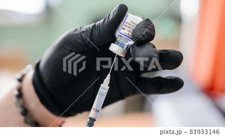 Kalush, Ukraine September 14, 2021: Pfizer antiviral vaccine in a vial against covid infection. 83933146