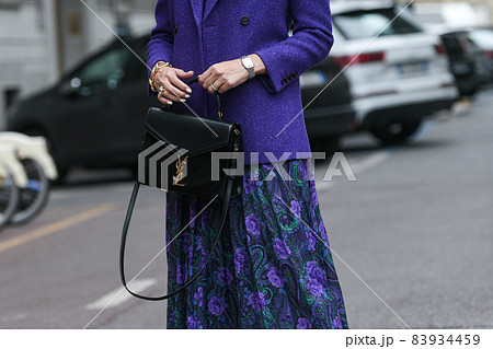 Milan, Italy - September 25, 2021:  Street style outfit, woman wearing a fashionable outfit on the streets of Milan, Italy. 83934459