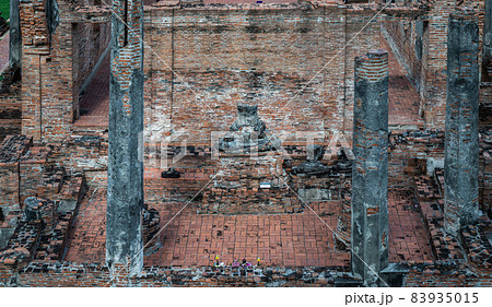 Ancient old buddha statue sculpture is damaged at the old temple in Ayuthaya. Ancient old buddha statue sculpture is damaged at the old temple in Ayuthaya. 83935015