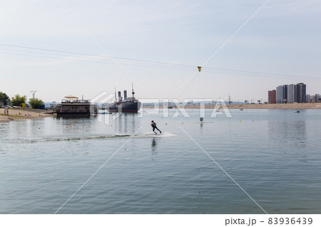 Irkutsk, Russia - July 26, 2021, Riding a water board on the lake. Editorial 83936439
