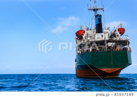 Large industrial ship sailing in the Indian ocean near Zanzibar, Tanzania Large industrial ship sailing in the Indian ocean near Zanzibar, Tanzania 83937189