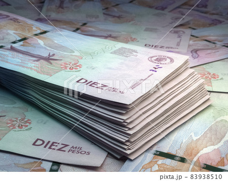 Colombian money. Colombian peso banknotes. 10 COP pesos bills. Colombian money. Colombian peso banknotes. 10 COP pesos bills. 83938510
