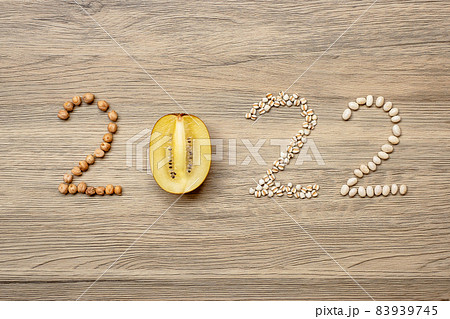2022 Happy New Year and New You with fruit and vegetable; kiwi, adlay and Bean on table. Goals, Healthy, Motivation, Resolution, Time to New Start, dieting and world food day concept 83939745