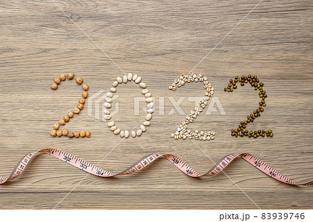 2022 New Year and New You with organic Beans; white, green, chickpeas and Adlay on table. Goals, Healthy, Motivation, Resolution, Weight loss, dieting and world food day concept 2022 New Year and New You with organic Beans; white, green, chickpeas and Adlay on table. Goals, Healthy, Motivation, Resolution, Weight loss, dieting and world food day concept 83939746