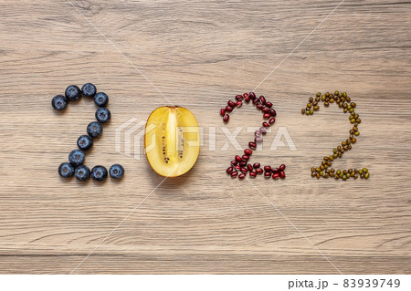 2022 Happy New Year and New You with fruit and vegetable; Blueberries, kiwi and Bean on table. Goals, Healthy, Motivation, Resolution, Time to New Start, dieting and world food day concept 2022 Happy New Year and New You with fruit and vegetable; Blueberries, kiwi and Bean on table. Goals, Healthy, Motivation, Resolution, Time to New Start, dieting and world food day concept 83939749