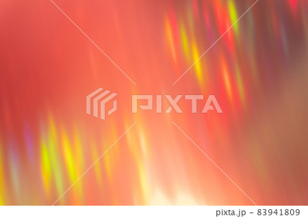 Defocused light overlay. Blur sparks. Disco party beam. Optic shine reflection. Bokeh neon red yellow green colorful rays on bright abstract background. Defocused light overlay. Blur sparks. Disco party beam. Optic shine reflection. Bokeh neon red yellow green colorful rays on bright abstract background. 83941809