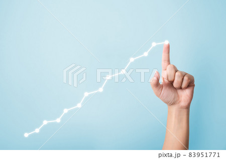 Growth business concept. Hand pointing increase graph moving up and copy space 83951771