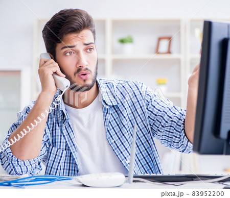 Frustrated young man due to weak internet reception 83952200