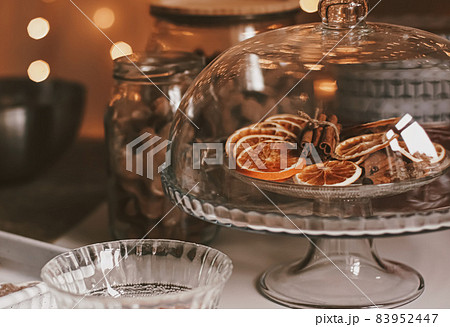 Christmas baking and cooking recipe concept. Food ingredients and preparation process of traditional homemade gingerbread men biscuits in the kitchen at home during winter holidays Christmas baking and cooking recipe concept. Food ingredients and preparation process of traditional homemade gingerbread men biscuits in the kitchen at home during winter holidays 83952447