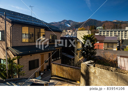 Shibu onsen town in valley at spring, Nagano Shibu onsen town in valley at spring, Nagano 83954106