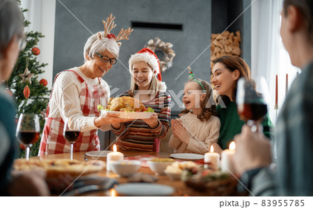 family celebrating Christmas 83955785
