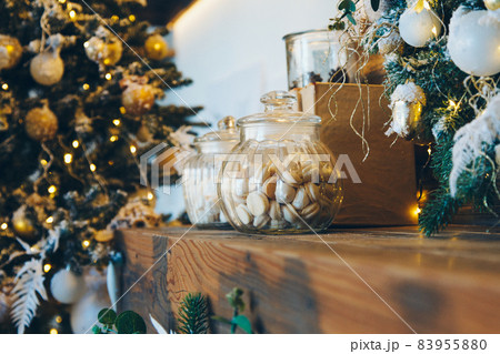 Meringue in a glass jar as part of the Christmas interior 83955880
